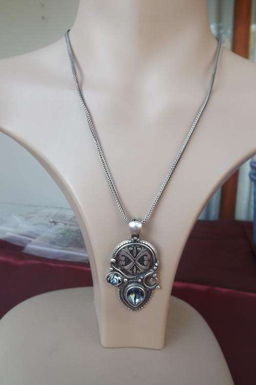 Antique Miglio pendant with blue Swarouski crystal on 925 silver chain.Pendant length 5.5cm.
