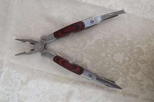 Multi tool-written on handle GWPP2001-2010.Used but in fine condition.Length 17 cm