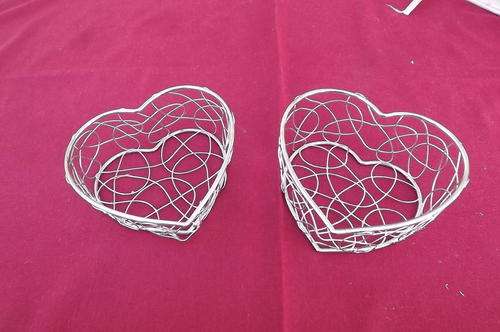 Set of 2 heart shaped wire baskets.As new.Size 11 x 9 cm each