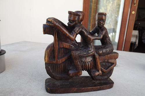 Wooden carving of couple on motorbike 17 cm high 18 cm long