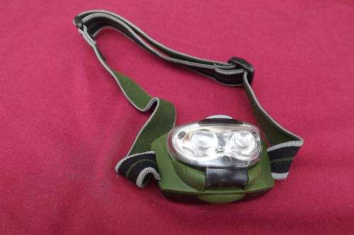 Energizer hands free head light with 3 batteries in working condition