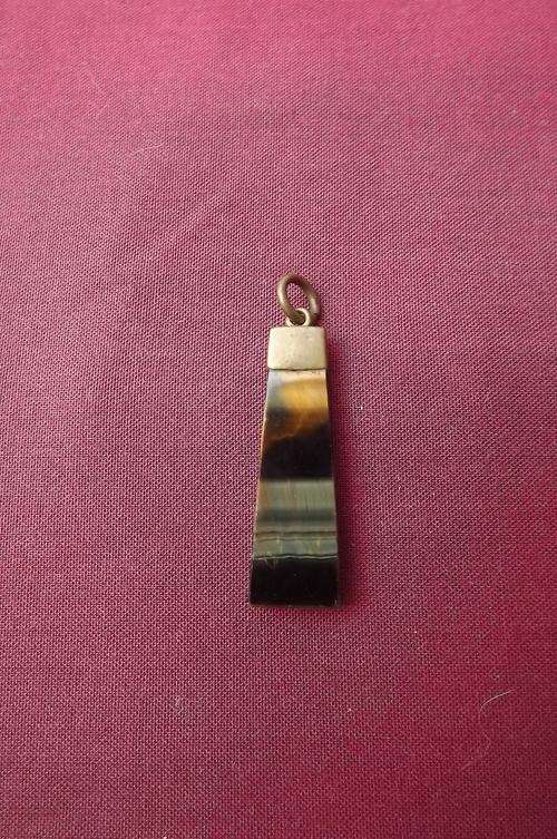 Very pretty genuine stone pendant with brass top piece show different colours-Good condition