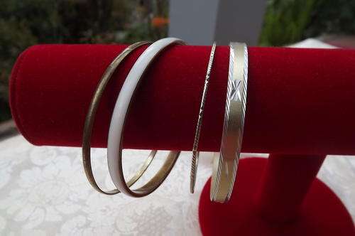 Set of 4 different bangles in copper and brass. - nice combination.