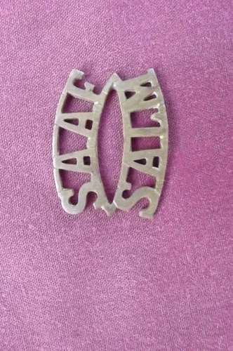 South African Air Force.Shoulder title badge WW2 era. 3 by 3cm. Lugs broken off