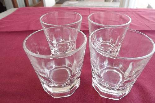 Set of 4 glasses with heavy bottoms.Height 8cm.In good condition.
