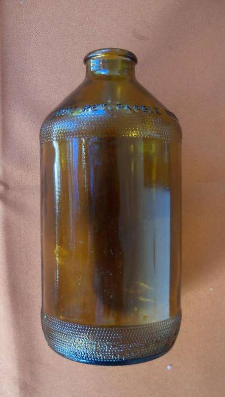 Brown Dumpy Beer Bottle marked T4  -  1145 . By SA Breweries