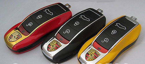RED Porsche key ring cellphone, colour screen, camera, mp3 player!!! World's smallest phone!