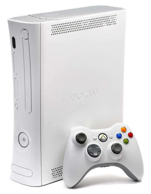 Xbox 360 with 2 remotes and 5 games