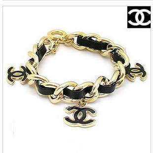 CHANEL BLACK AND GOLD BRACELET