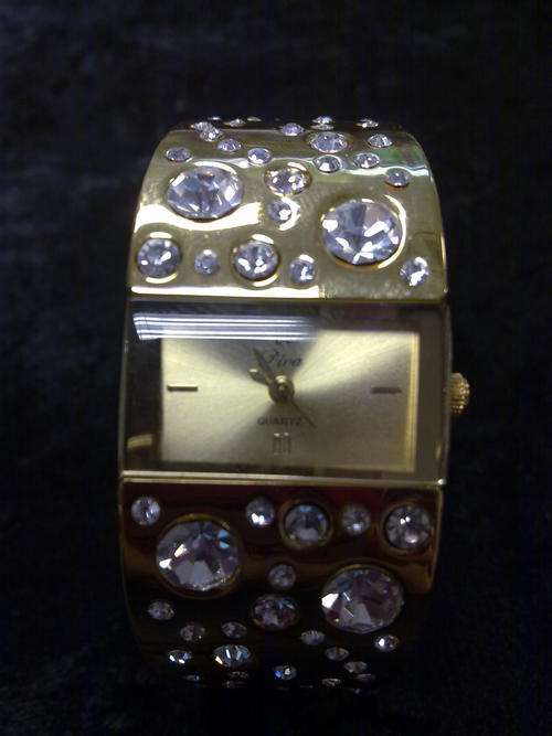 GOLD DIAMOND BANGLE WATCH