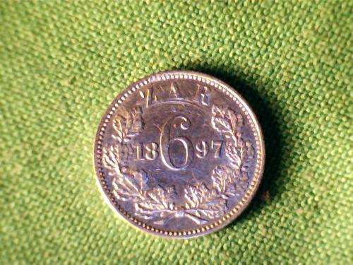 ZAR 1897 SIX PENCE IN AU/UNC WITH GOOD CLEAR SCRAPER MARKS.