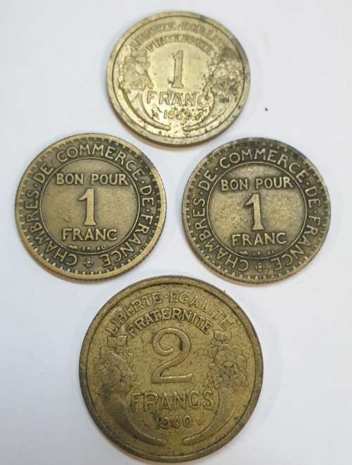 1922 ,1924 ,1939 ONE FRANC COINS AND A 1930 TWO FRANCS COIN!! ONE BID NO RESERVE AUCTION.