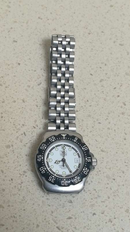 ### Tag Heuer Formula 1 White dial Ladies watch pre owned medium to large bracelet fit ###