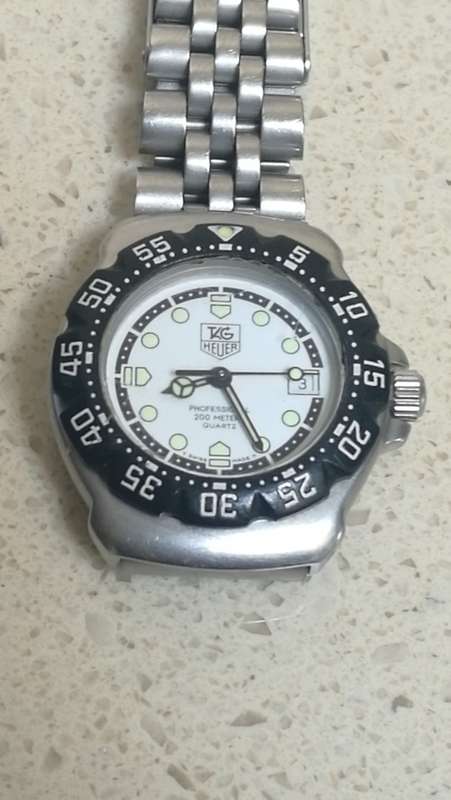 ### Tag Heuer Formula 1 White dial Ladies watch pre owned medium to large bracelet fit ###