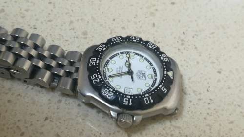 ### Tag Heuer Formula 1 White dial Ladies watch pre owned medium to large bracelet fit ###