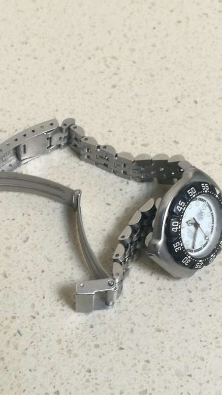 ### Tag Heuer Formula 1 White dial Ladies watch pre owned medium to large bracelet fit ###