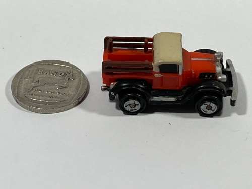 Micro red car old pickup