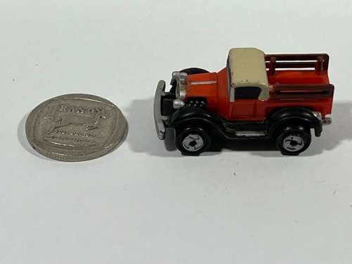 Micro red car old pickup