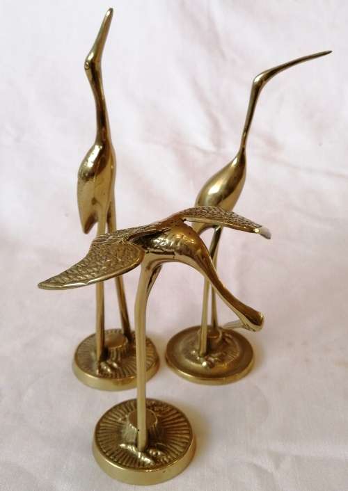 Mid century trio of brass herons
