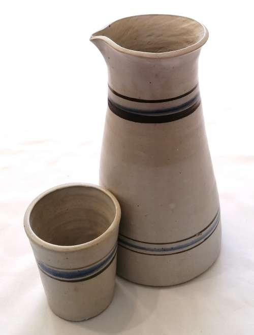 Beautiful, Modern hand-thrown set of ceramic drinking tumblers and carafe