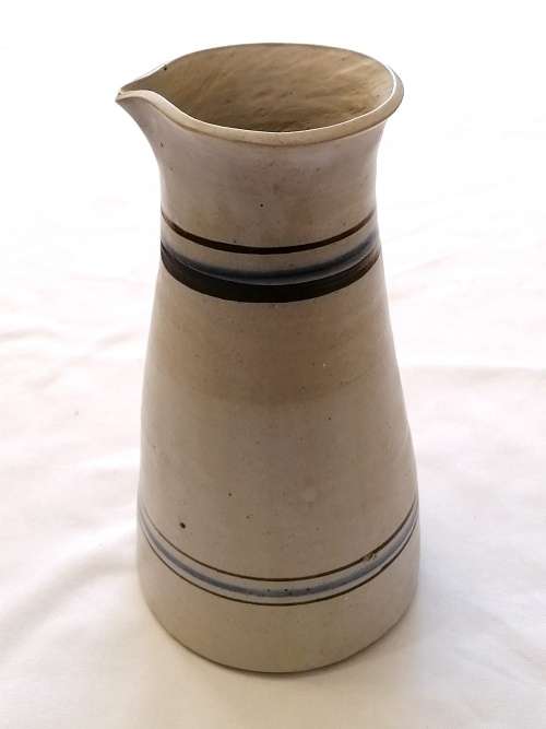 Beautiful, Modern hand-thrown set of ceramic drinking tumblers and carafe