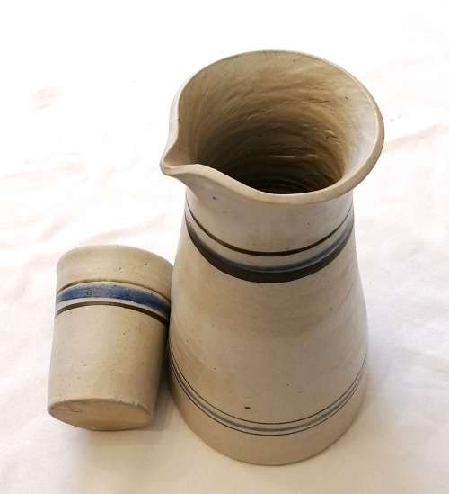 Beautiful, Modern hand-thrown set of ceramic drinking tumblers and carafe