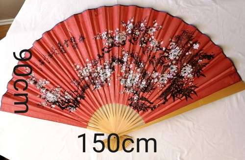 Extra Large, decorative, Chinese wall fan. Red with blooming cherry branch and Chinese characters.