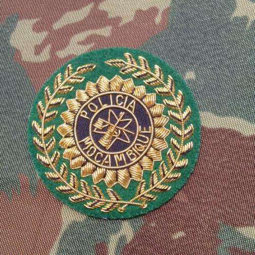 Mozambique police (PRM) bullion wire cap badge - near mint condition