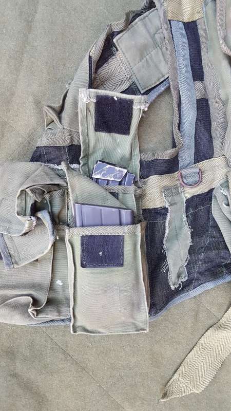 a scarce and rarely seen outside Zim - Commando Bn Battle-jacket olive green canvas - almost impossi