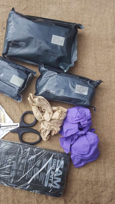 a 8 piece job-lot of GWOT era medical supplies (all timex) and suited to training use - all unused