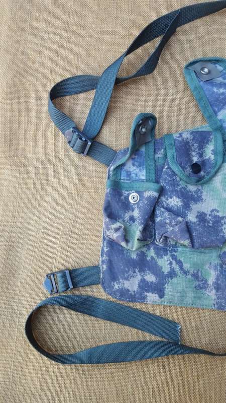 on auction a new custom made Zim splotch camo in nylon chest webbing sized for 6 AK 47 or R4/5 mags