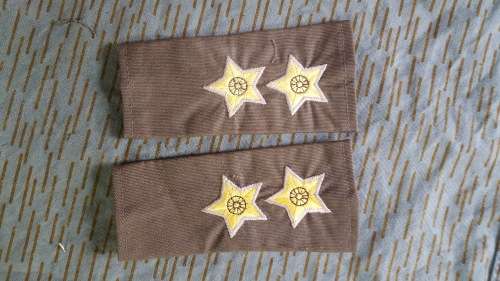 pair of unused SADF era Pvt purchase Lt officer`s rank slides in nutria for field-dress (large yello