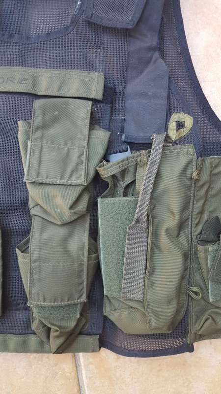 pre-1992 era SAP STF olive green urban assault vest with 2 x MP5 SMG mags ammo panel in good used co