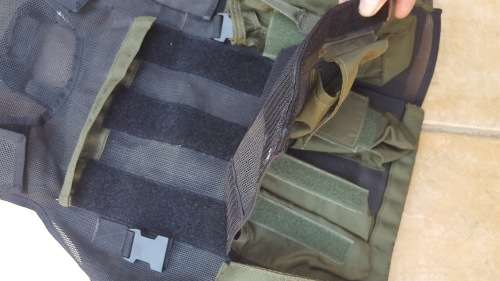 pre-1992 era SAP STF olive green urban assault vest with 2 x MP5 SMG mags ammo panel in good used co
