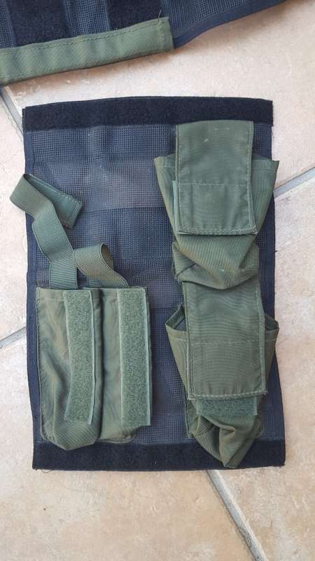 pre-1992 era SAP STF olive green urban assault vest with 2 x MP5 SMG mags ammo panel in good used co