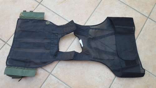 pre-1992 era SAP STF olive green urban assault vest with 2 x MP5 SMG mags ammo panel in good used co