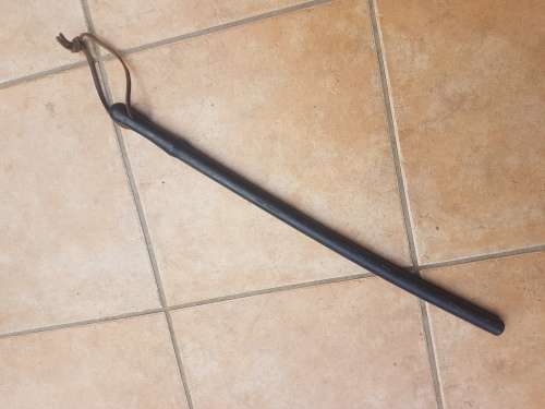 original pre-1994 SAP issue riot unit baton (rubber) overall length 75cm with leather wrist strap