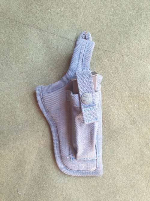 variation used condition original SAP era issue blue cotton canvas side-arm holster with thumb-break