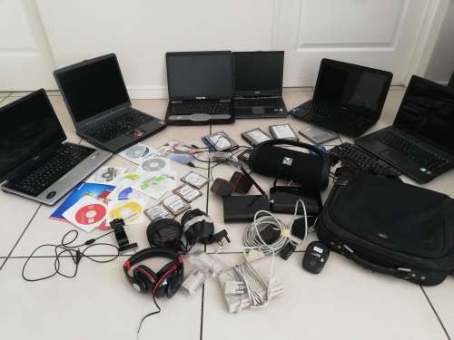 ***6x LAPTOPS,HARD DRIVES, DISKS, WIFI ROUTERS, REMOTE BOOSTERS, BAG, SPEAKERS**READ AD******
