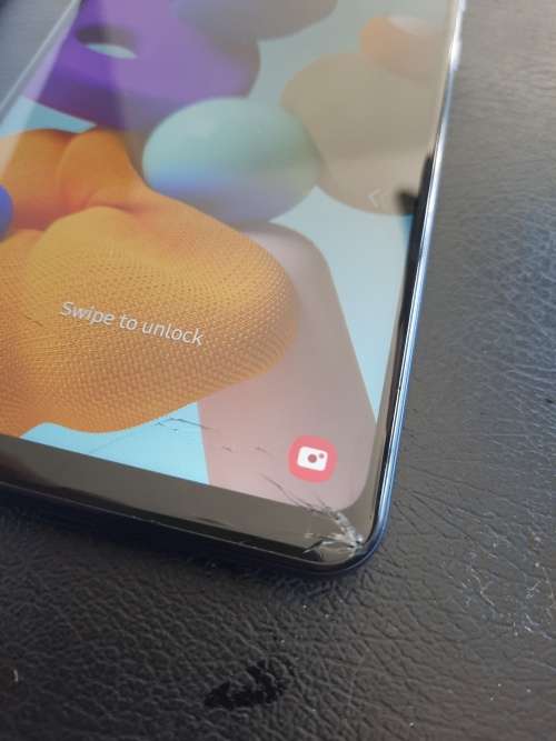 ***FREE FREIGHT**SAMSUNG GALAXY A21S, QUAD CAM, 32GB, BLUE** SLIGHT SCRACK AT BOTTOM OF SCREEN*****