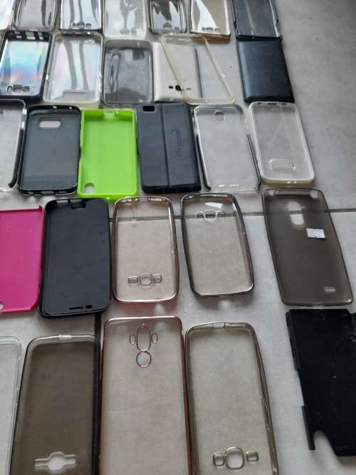 **LATE ENTRY**FREE FREIGHT FRIDAY**BULK LOT OF 100 CELL PHONE COVERS**MIXED LOT NOT IN PACKAGING****