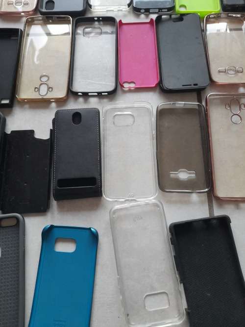 **LATE ENTRY**FREE FREIGHT FRIDAY**BULK LOT OF 100 CELL PHONE COVERS**MIXED LOT NOT IN PACKAGING****