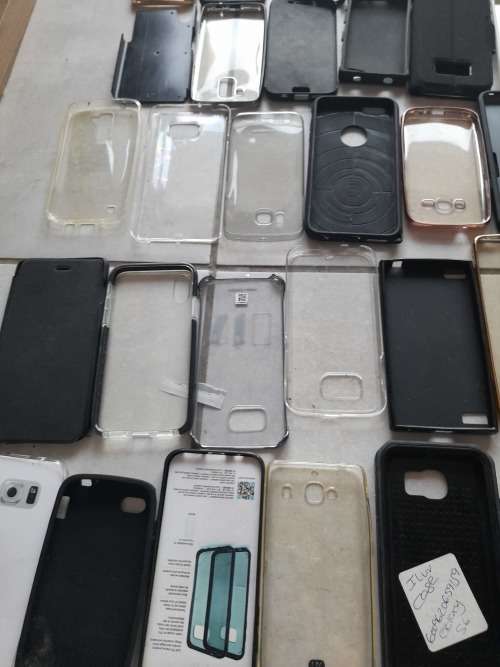**LATE ENTRY**FREE FREIGHT FRIDAY**BULK LOT OF 100 CELL PHONE COVERS**MIXED LOT NOT IN PACKAGING****