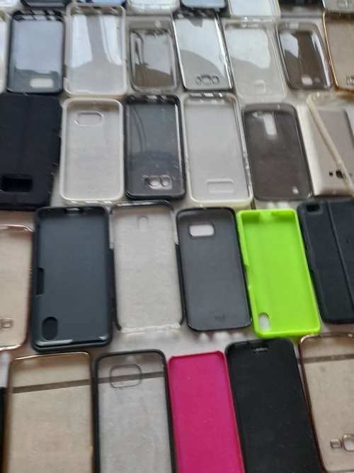 **LATE ENTRY**FREE FREIGHT FRIDAY**BULK LOT OF 100 CELL PHONE COVERS**MIXED LOT NOT IN PACKAGING****