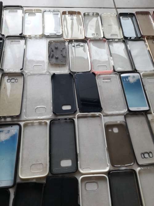 **LATE ENTRY**FREE FREIGHT FRIDAY**BULK LOT OF 100 CELL PHONE COVERS**MIXED LOT NOT IN PACKAGING****