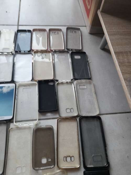 **LATE ENTRY**FREE FREIGHT FRIDAY**BULK LOT OF 100 CELL PHONE COVERS**MIXED LOT NOT IN PACKAGING****