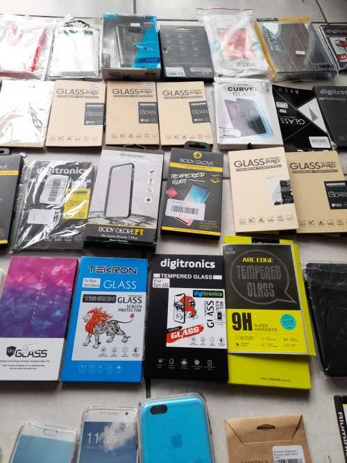 **LIQUIDATION***BULK LOT OF 60 CELL PHONE COVERS AND SCREEN PROTECTORS****OVER R10 000 RETAIL***