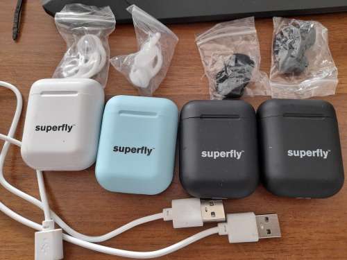 **FREE FREIGHT FRIDAY**LOT  OF 4 NEW SUPERFLY AIR PODS**BLACK, WHITE AND BLUE**WITH CHARGER AND CASE