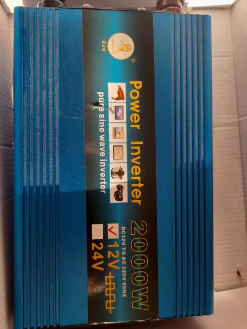 ***LOT OF OFF THE GRID SUPPLIES**2000W INVERTER(FAULTY), BATTERY CHARGER, NEW BATTERY, 12V LED LIGHT