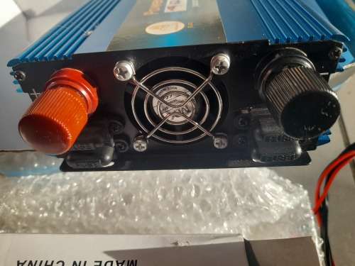 ***LOT OF OFF THE GRID SUPPLIES**2000W INVERTER(FAULTY), BATTERY CHARGER, NEW BATTERY, 12V LED LIGHT